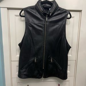 Black leather vest by Liz Wear. Hidden hood if needed.